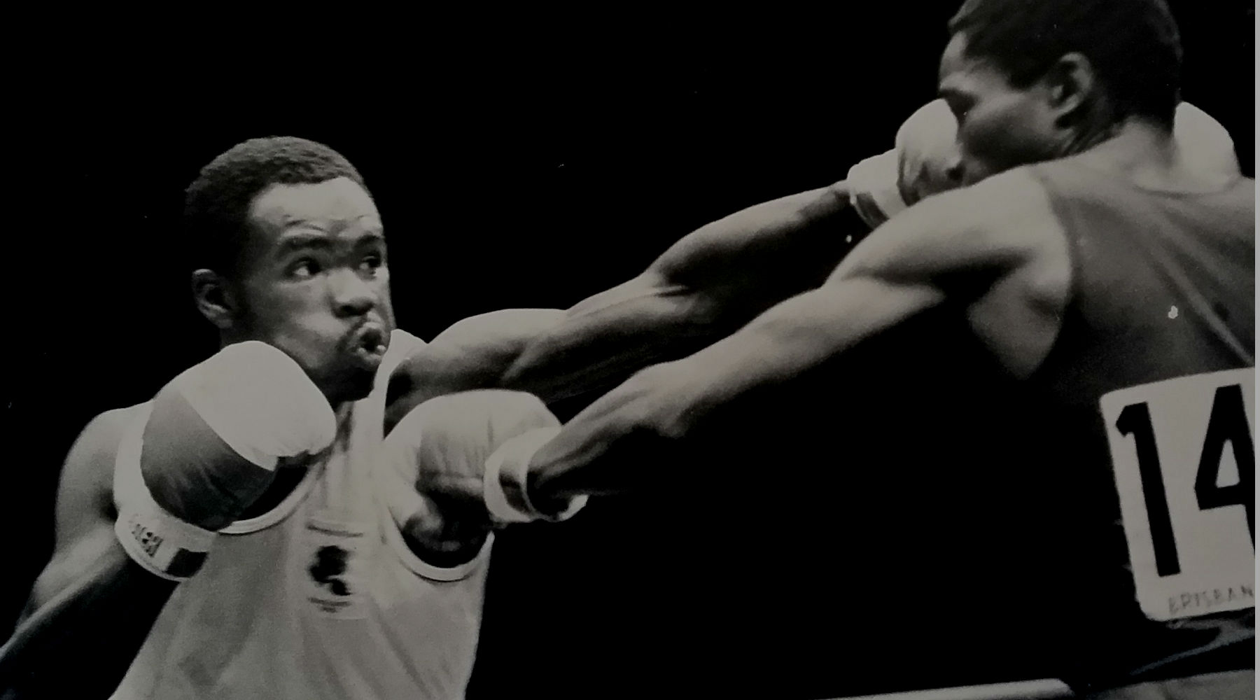 Clyde Mcintosh throwing a perfect left jab in a boxing match.
